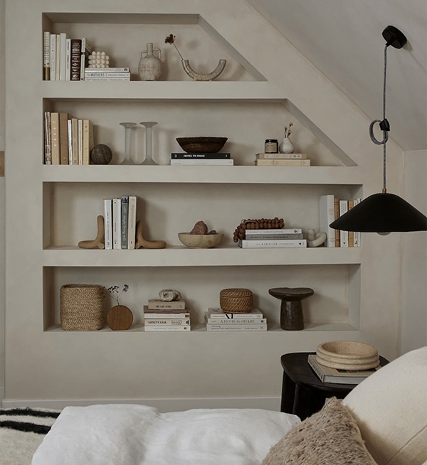 Wellington home living room with built-in stepped shelves by Agathe Corbet