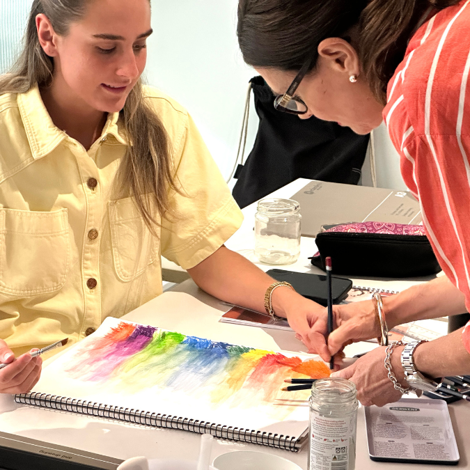 Interior design students selecting tiles and colour samples together