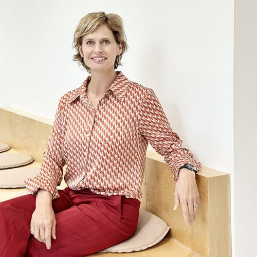 Kylie Hickman, Sydney Design School educator, seated portrait