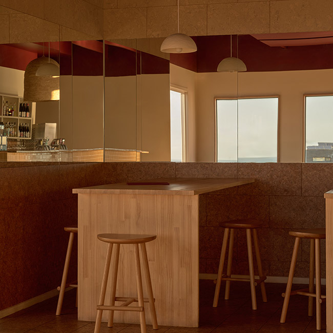 Rove kitchen with timber cabinetry and bar stools by Rebecca Leijer