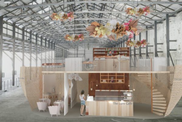 Warehouse exhibition interior with a floral ceiling installation by Victoria Saliakouras